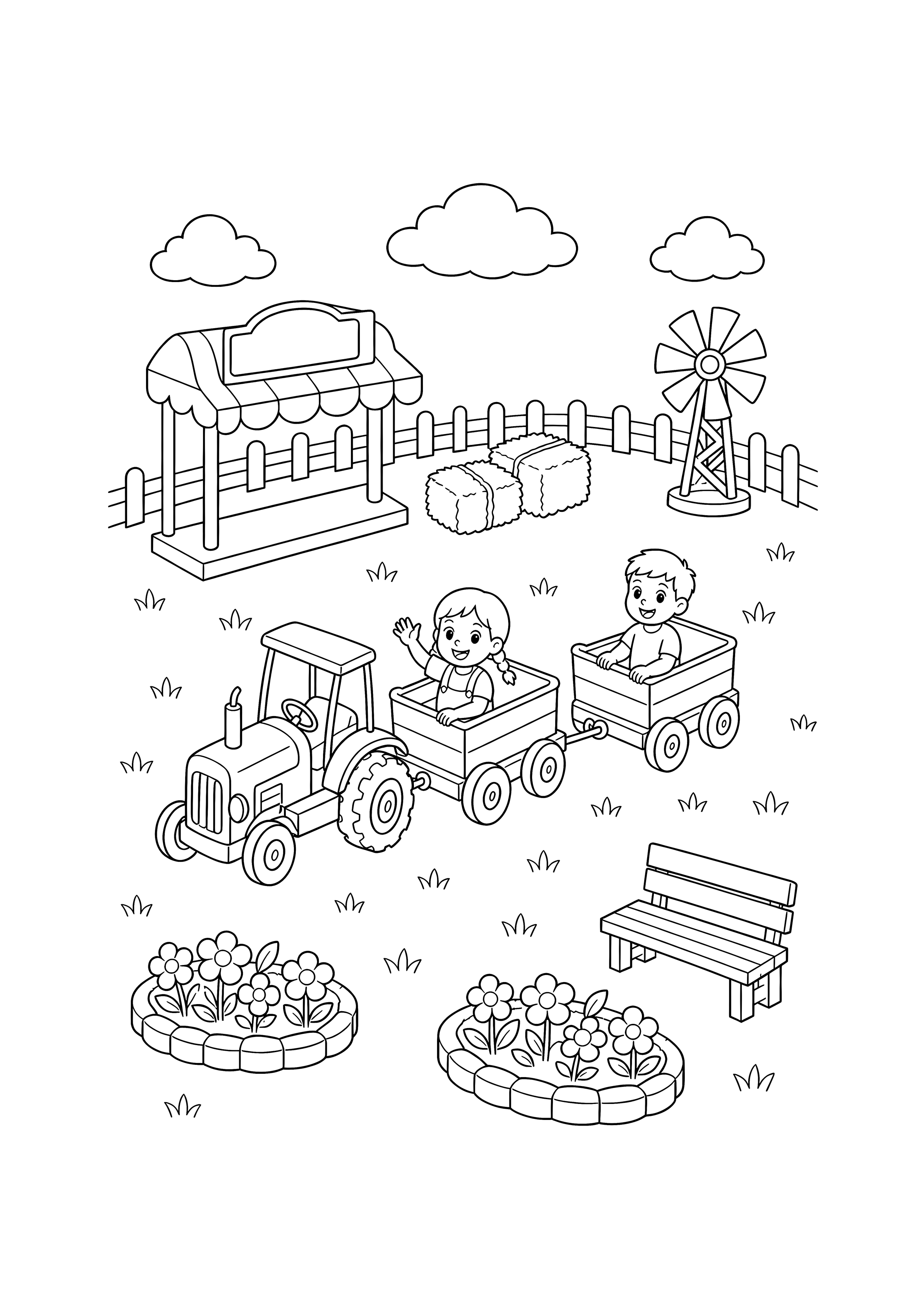 Mini-Traktorfahrt auf der Kirmes: Ein kleiner Traktor zieht zwei Kinderwagen auf einer ovalen Schiene zwischen Heuballen, Windrad, Bank und Blumen.